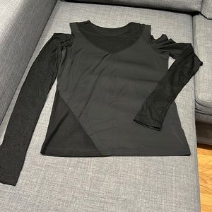 Women’s cold shoulder top embellished with lace and sheer detailing
